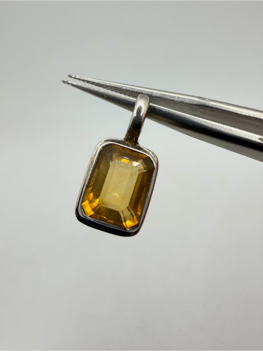 Stunning‎ 7x10mm emerald cut orangey/yellow CITRINE pendant in sterling silver!